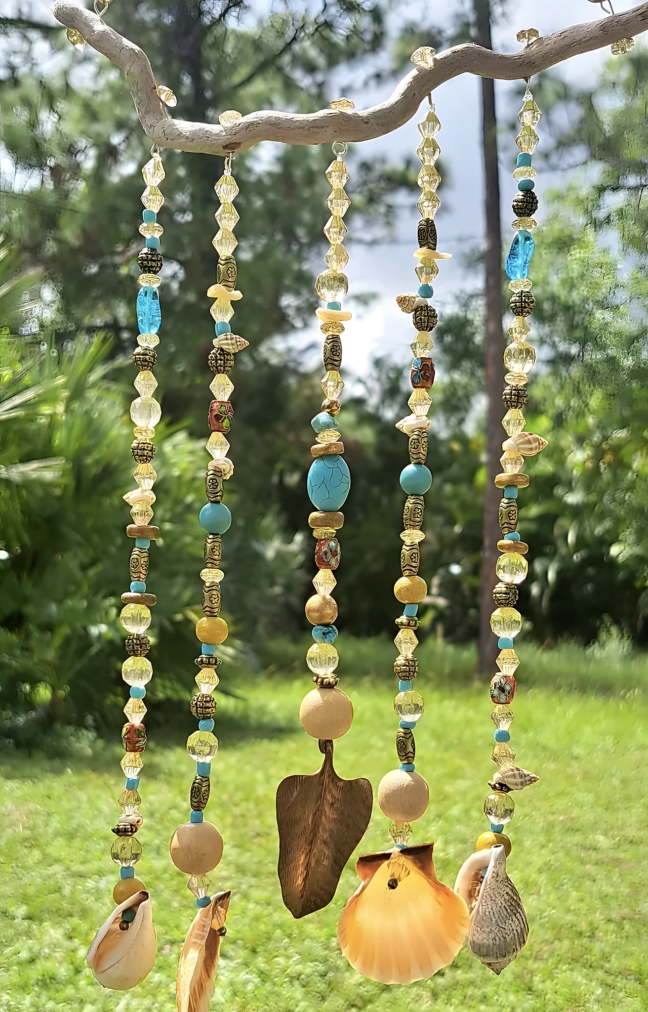 Beaded outdoor wind chime with shells, faux stones, and wood spacer beads; intermediate level.